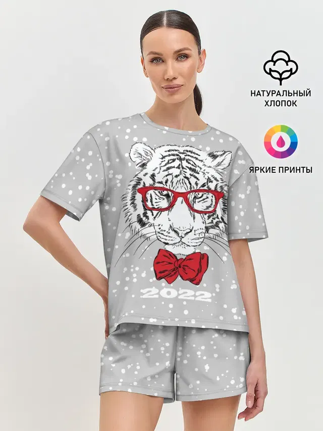 Белый тигр с красным бантом