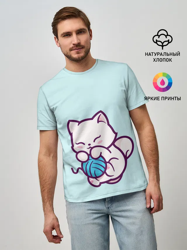 Белый котенок с клубком милый