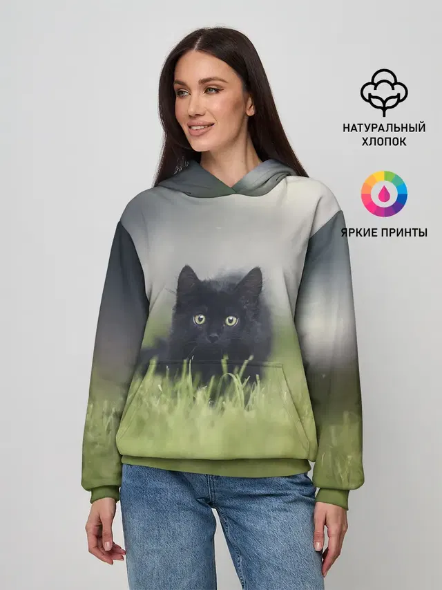 черный кот на лугу