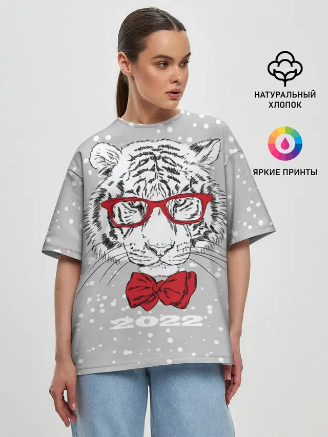 Белый тигр с красным бантом